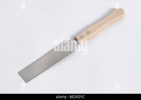 Kugihiki, Japanese flush cutting double-sided wood hand saw isolated on white background Stock Photo