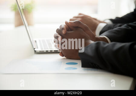 Statistics analysis concept, businessmen working with laptop and Stock Photo