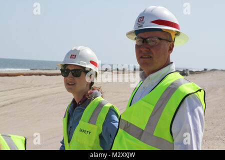 WALLOPS ISLAND, Va. – Rachel Haug, from the Norfolk District planning office, and Mike Darrow, chief of the Norfolk District water resources division, tour the newly built beach at the NASA Wallops Island Flight Facility here, May 7, 2012. The new beach will help protect more than $1 billion in federal government and Commonwealth of Virginia assets located here.  The Wallops Island facility is home to, not only NASA, but also the US Navy Surface Combat Systems Center and the Mid-Atlantic Regional Spaceport making this a growing economic generator for the Commonwealth of Virginia and the region Stock Photo