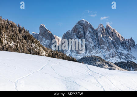 The Odle mountain peaks of the Dolomites on a winter morning after fresh snowfall Stock Photo