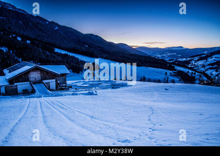 A view towards the village of Santa Maddalena, Province of Bolzano - South Tyrol, Italy on a winter evening Stock Photo