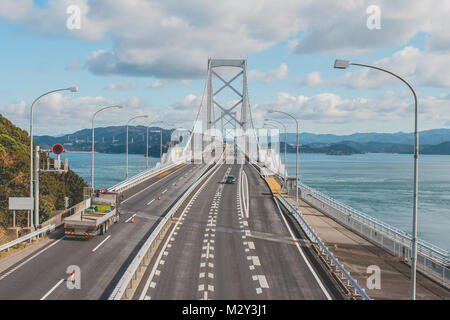 Great Naruto bride cross over ocean and Naruto strait that is beautiful architecture and landmark of Tokushima, Japan. Stock Photo