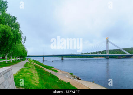 View of the Lumberjacks Candle Bridge and the Kemijoki River in Rovaniemi, Lapland, Finland Stock Photo