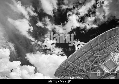 Black & White Photograph of a Very Large Array (VLA) Radio Telescope located at the National Radio Astronomy Observatory Site in Socorro, New Mexico. Stock Photo