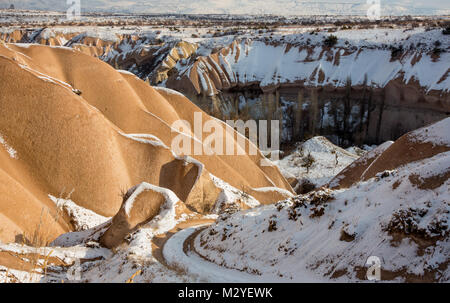 Concept of global warming. Morocco, High Atlas Mountains. Peak covered by snow and Sand dunes in the Sahara Desert, Merzouga, Stock Photo