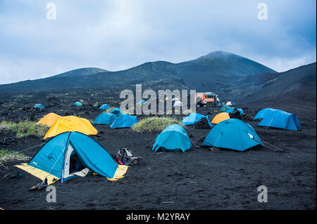 Tourist campsite at the Tolbachik volcano, Kamchatka, Russia Stock Photo