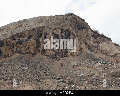 Rich deposits of Obsidian, a volcanic glass can be found in Armenia, here at the side of highway M4 between Yerevan and Sevan lake Stock Photo