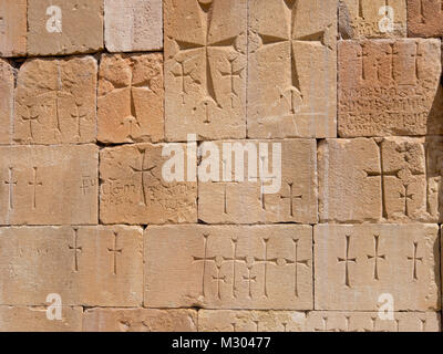 Noravank Monastery in southern Armenia, bas-relief crosses on the church wall, close up Stock Photo