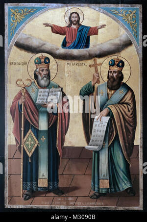 Religious painting titled St Cyril and St Methodios from 19th century displayed at the Alexander Nevsky Crypt Museum which houses the largest collection of Orthodox icons in Europe from the 13th to the 19th century located at the crypt of the Bulgarian Orthodox Saint Alexander Nevsky Cathedra in the city of Sofia capital of Bulgaria. Stock Photo