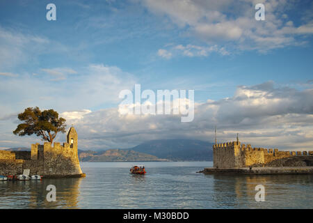 Amazing sunset of the port of Nafpaktos town, Western Greece Stock Photo