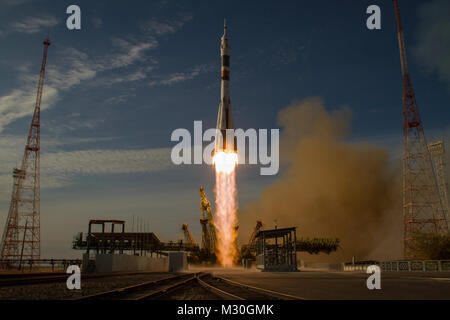 The Soyuz rocket with Expedition 33/34 crew members, Soyuz Commander Oleg Novitskiy, Flight Engineer Kevin Ford of NASA, and Flight Engineer Evgeny Tarelkin of ROSCOSMOS onboard the TMA-06M spacecraft launches to the International Space Station on Tuesday, October 23, 2012, in Baikonur, Kazakhstan. Ford, Novitskiy and Tarelkin will be on a five-month mission aboard the International Space Station.  Photo Credit: (NASA/Bill Ingalls) Expedition 33 Soyuz Launch by AirmanMagazine Stock Photo