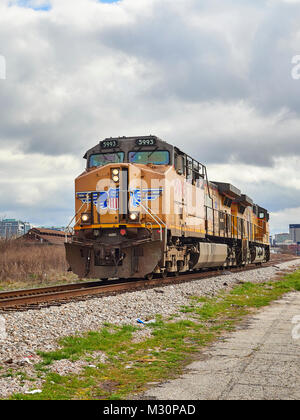 Union Pacific diesel locomotive #5993 traveling along a railroad siding in Montgomery Alabama, USA. Stock Photo