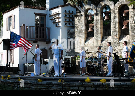140519-N-HG258-008 SAN ANTONIO, TEXAS (May 19, 2014) The Navy Band Cruisers perform the National Anthem during an afternoon concert at the Arneson River Theater on the riverwalk in San Antonio, Texas.  The U.S. Navy Band Cruisers, based in Washington and led by Senior Chief Musician Leon Alexander, is currently on an 12-day tour of Texas. One of the band's primary responsibilities, national tours increase awareness of the Navy in places that don't see the Navy work on a regular basis. (U.S. Navy photo by MUC Stephen Hassay/Released) 140519-N-HG258-008 by United States Navy Band Stock Photo