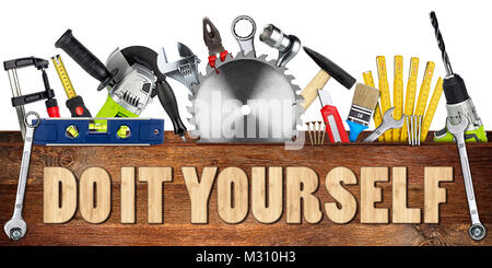 DIY tools collage concept behind wooden plank with copy space and circular saw blade isolated on white wide panorama background Stock Photo