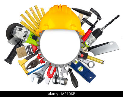 diy industrial craft concept tools behind empty buzz saw blade and building-site helmet isolated on white background Stock Photo