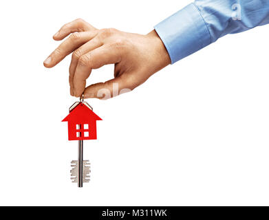 Man's hand in shirt holding house keys  isolated on white background. High resolution product. Close up. Stock Photo