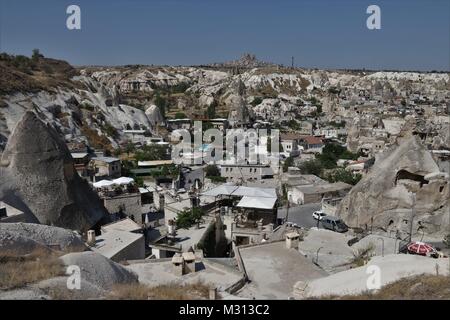 Looking down onto the  fairy chimneys ,typical geologic formations of Cappadocia, goreme ,excavated by people and used as houses and churches Stock Photo