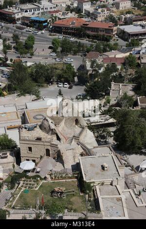 Looking down onto the  fairy chimneys ,typical geologic formations of Cappadocia, goreme ,excavated by people and used as houses and churches Stock Photo