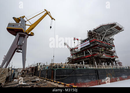 Construction and assembly of the top side of the wellhead platform for Phase 2 of the Yury Korchagin oil rig field development project Stock Photo