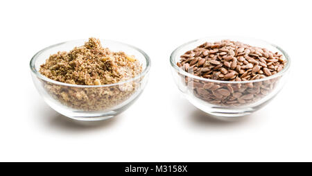Minced and whole linseeds isolated on white background. Stock Photo