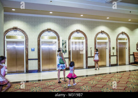 Baltimore Maryland,Baltimore Street,Radisson Plaza Lord Baltimore,hotel,1928,historic building,lobby,elevator,lift,woman female women,girl girls,young Stock Photo