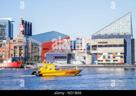 Baltimore Maryland,Inner Harbor,harbour,Harborplace,Patapsco River,waterfront,National Aquarium,skyline,Seadog Speedboat Cruises,boat,passenger passen Stock Photo