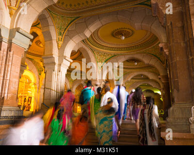 MYSORE, INDIA - January 11 2018: People walk in the Colorful ornate interior halls of royal Mysore Palace, Karnataka, India