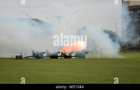 Cannons fire during the 36th Inf. Div Change of Command ceremony at Camp Mabry in Austin, Texas on June 21, 2014. Brig. Gen. Lester Simpson took command of the 36th Infantry Division, Texas Army National Guard, from Maj. Gen. James K. 'Red' Brown at a change of command ceremony at Camp Mabry in Austin, Texas. (Texas Army National Guard photo by Staff Sgt. Jennifer Atkinson, 36th Inf. Div. Public Affairs Office)  u201cT-Patchers u201d greet new commander by Texas Military Department Stock Photo