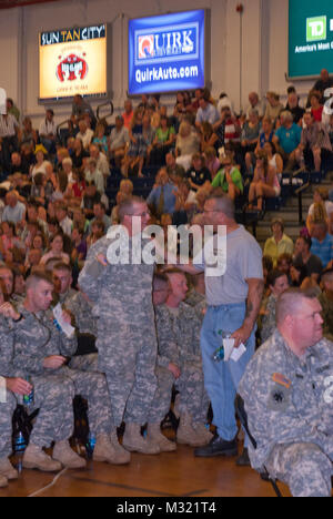 Soldiers from the 133rd Engineering Battalion and 1035th Survey and Design Team joined family and friends at the Portland Exposition Building Saturday, August 10 during a hero’s send off for the troops.  The soldiers leave soon for training in Mississippi before heading to Afghanistan where they will aid in the downsizing of bases there.  Lt. Col. Dean Preston, Commander of the 133rd addressed the concerns of the family and guardians gathered at the ceremony. “These are the heroes you built,” he said. “Be proud of the job you have done.” (Maine Army National Guard photo by Sgt. Angela Parady,  Stock Photo