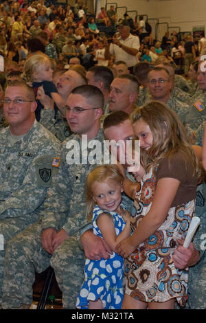 Soldiers from the 133rd Engineering Battalion and 1035th Survey and Design Team joined family and friends at the Portland Exposition Building Saturday, August 10 during a hero’s send off for the troops.  The soldiers leave soon for training in Mississippi before heading to Afghanistan where they will aid in the downsizing of bases there.  Lt. Col. Dean Preston, Commander of the 133rd addressed the concerns of the family and guardians gathered at the ceremony. “These are the heroes you built,” he said. “Be proud of the job you have done.” (Maine Army National Guard photo by Sgt. Angela Parady,  Stock Photo