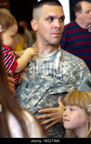 Soldiers from the 133rd Engineering Battalion and 1035th Survey and Design Team joined family and friends at the Portland Exposition Building Saturday, August 10 during a hero’s send off for the troops.  The soldiers leave soon for training in Mississippi before heading to Afghanistan where they will aid in the downsizing of bases there.  Lt. Col. Dean Preston, Commander of the 133rd addressed the concerns of the family and guardians gathered at the ceremony. “These are the heroes you built,” he said. “Be proud of the job you have done.” (Maine Army National Guard photo by Sgt. Angela Parady,  Stock Photo