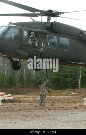 On November 2, Soldiers of the Maine Army National Guard’s Company C, 1st Battalion, 126th Aviation Regiment spent Nov. 2 in Northern Maine, working alongside Maine Park Rangers and representatives from Baxter State Park to airlift building supplies and raw materials to camping sites throughout the park.  The mission, dubbed “Operation Timberhook” involved moving materials such as cedar logs, firewood, propane tanks, and sand, to remote locations around the park for use in the renovation of old camping lean-tos around the park, and the construction of new ones near Wassataquik Lake. (Maine Arm Stock Photo