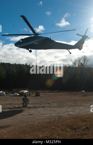 On November 2, Soldiers of the Maine Army National Guard’s Company C, 1st Battalion, 126th Aviation Regiment spent Nov. 2 in Northern Maine, working alongside Maine Park Rangers and representatives from Baxter State Park to airlift building supplies and raw materials to camping sites throughout the park.  The mission, dubbed “Operation Timberhook” involved moving materials such as cedar logs, firewood, propane tanks, and sand, to remote locations around the park for use in the renovation of old camping lean-tos around the park, and the construction of new ones near Wassataquik Lake. (Maine Arm Stock Photo