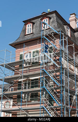 Detailed picture of a castle renovation with scaffolding framework Stock Photo
