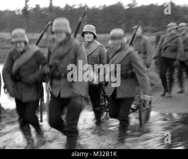 German infantry soldiers are on the march, ca. 1940. Stock Photo