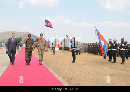 (left to right)Ambassador William Headt, the U.S. Ambassador to the Kingdom of Cambodian; Royal Cambodian Army Gen. Meas Sophea; and Maj. Gen. Todd McCaffrey, U.S. Army Pacific's Deputy Commander, troop the line to conclude the Angkor Sentinel 2016 closing ceremony March 25, 2016, at the Training School for Multinational Peacekeeping Forces in Kampong Speu Province, Cambodia. This year marked the seventh iteration of the annual bilateral military exercise hosted by the Royal Cambodian Armed Forces and sponsored by the U.S. Army Pacific that’s designed to collectively strengthen the two countri Stock Photo