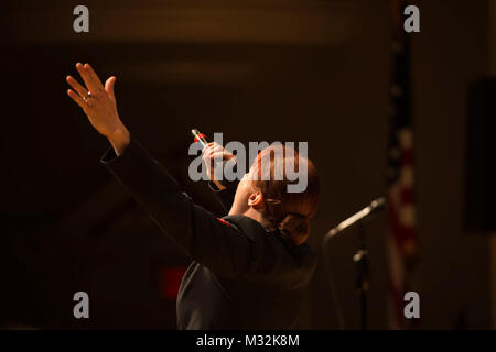 EDINBORO, PA (April 5, 2016) Musician 1st Class Maia Rodriguez sings with the United States Navy Band Sea Chanters chorus during a concert at Edinboro University. The Sea Chanters are on a 22-day tour of the northeastern United States. (U.S. Navy photo by Chief Musician Melissa Bishop/Released) 160405-N-NW255-069 by United States Navy Band Stock Photo