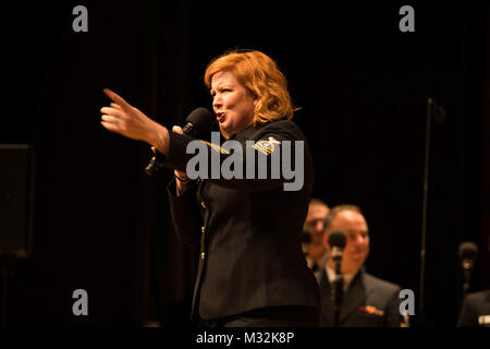 EDINBORO, PA (April 5, 2016) Chief Musician Rachel Sarracco sings with the United States Navy Band Sea Chanters chorus during a concert at Edinboro University. The Sea Chanters are on a 22-day tour of the northeastern United States. (U.S. Navy photo by Chief Musician Melissa Bishop/Released) 160405-N-NW255-093 by United States Navy Band Stock Photo