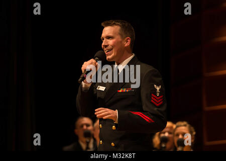 EDINBORO, PA (April 5, 2016) Musician 1st Class Bill Edwards sings with the United States Navy Band Sea Chanters chorus during a concert at Edinboro University. The Sea Chanters are on a 22-day tour of the northeastern United States. (U.S. Navy photo by Chief Musician Melissa Bishop/Released) 160405-N-NW255-108 by United States Navy Band Stock Photo