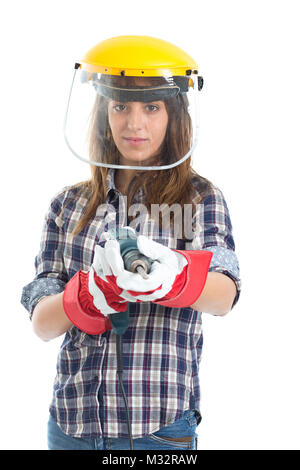 Attractive young woman builder with drill tool happy for good work. Isolated on white background. Stock Photo