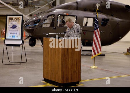 Chaplain (Maj.) Brad Hanna offers a prayer during the unveiling ceremony for four UH-72 'Lakota' Helicopters. The Oklahoma Army National Guard unveiled thr new helicopters on Sunday, April 7, 2014. The helicopters replaced four OH-58C “Kiowa” helicopters that had been in service for more than 30 years.  The UH-72A is a twin engine platform with a single four-bladed main rotor and was designed as a light utility helicopter for the U.S. Army and the Army National Guard.  The UH-72A will significantly increase the Oklahoma National Guard’s ability to conduct emergency support missions. Its primar Stock Photo