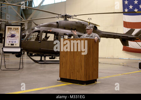 Maj. Gen. Myles Deering, the adjutant general for Oklahoma, offers comments during the unveiling of four UH-72 'Lakota' helicopters. The Oklahoma Army National Guard unveiled the new helicopters on Sunday, April 7, 2014. The helicopters replaced four OH-58C “Kiowa” helicopters that had been in service for more than 30 years.  The UH-72A is a twin engine platform with a single four-bladed main rotor and was designed as a light utility helicopter for the U.S. Army and the Army National Guard.  The UH-72A will significantly increase the Oklahoma National Guard’s ability to conduct emergency suppo Stock Photo