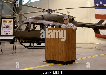 Maj. Gen. Myles Deering, the adjutant general for Oklahoma, offers comments during the unveiling of four UH-72 'Lakota' helicopters. The Oklahoma Army National Guard unveiled the new helicopters on Sunday, April 7, 2014. The helicopters replaced four OH-58C “Kiowa” helicopters that had been in service for more than 30 years.  The UH-72A is a twin engine platform with a single four-bladed main rotor and was designed as a light utility helicopter for the U.S. Army and the Army National Guard.  The UH-72A will significantly increase the Oklahoma National Guard’s ability to conduct emergency suppo Stock Photo