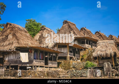 Small old wooden huts in the traditional indonesian village Bena on Flores island, Indonesia - UNESCO Heritage list Stock Photo