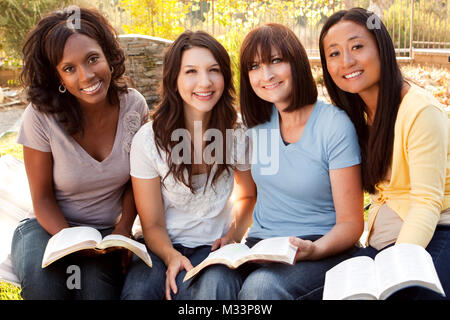 Beautiful diverse group of women talking and laughing. Stock Photo