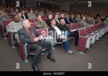 Friends and family turn out for Command Sgt. Maj. Richard L. Milford's, outgoing Texas Army National Guard Senior Enlisted Leader and Command Sgt. Maj. John L. Hoxie's, change of responsibility ceremony held at Camp Mabry in Austin, Texas, Jan. 30, 2015. Milford retires after 30 years of combined service in the U.S. Army and Texas Army National Guard. (U.S. Army National Guard photo by Sgt. 1st Class Malcolm McClendon). Texas Army National Guard Command Sergeant Major Change of Responsibility by Texas Military Department Stock Photo