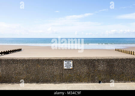 Caution promenade train warning sign in Barmouth Gwynedd North Wales UK Stock Photo