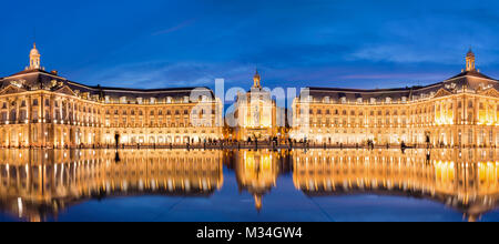 Place la Bourse in Bordeaux, the water mirror by night, France Stock Photo