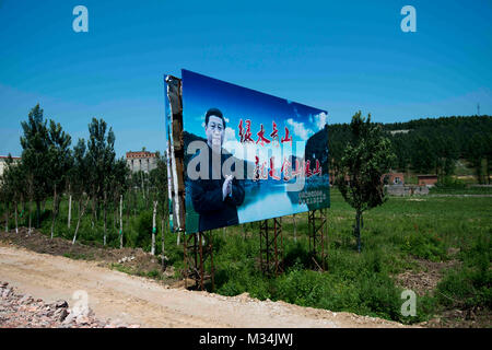 Jixi, Heilongjiang, China. 4th July, 2017. A biillboard with a picture of Xi Jinping at the entrance to Mashan. It reads 'A well protected environment is our treasure'. Credit: Dave Tacon/ZUMA Wire/ZUMAPRESS.com/Alamy Live News Stock Photo