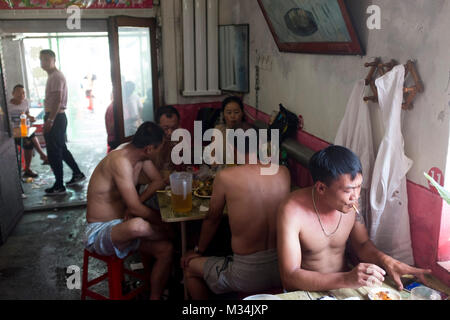 Jixi, Heilongjiang, China. 4th July, 2017. A local restaurant during the lunch rush in Liumao village, which has graphite mining as its chief industry. Credit: Dave Tacon/ZUMA Wire/ZUMAPRESS.com/Alamy Live News Stock Photo